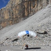 Successful landing after base jumping the 600m high east wall of the 5100m high Pan de Azucar
